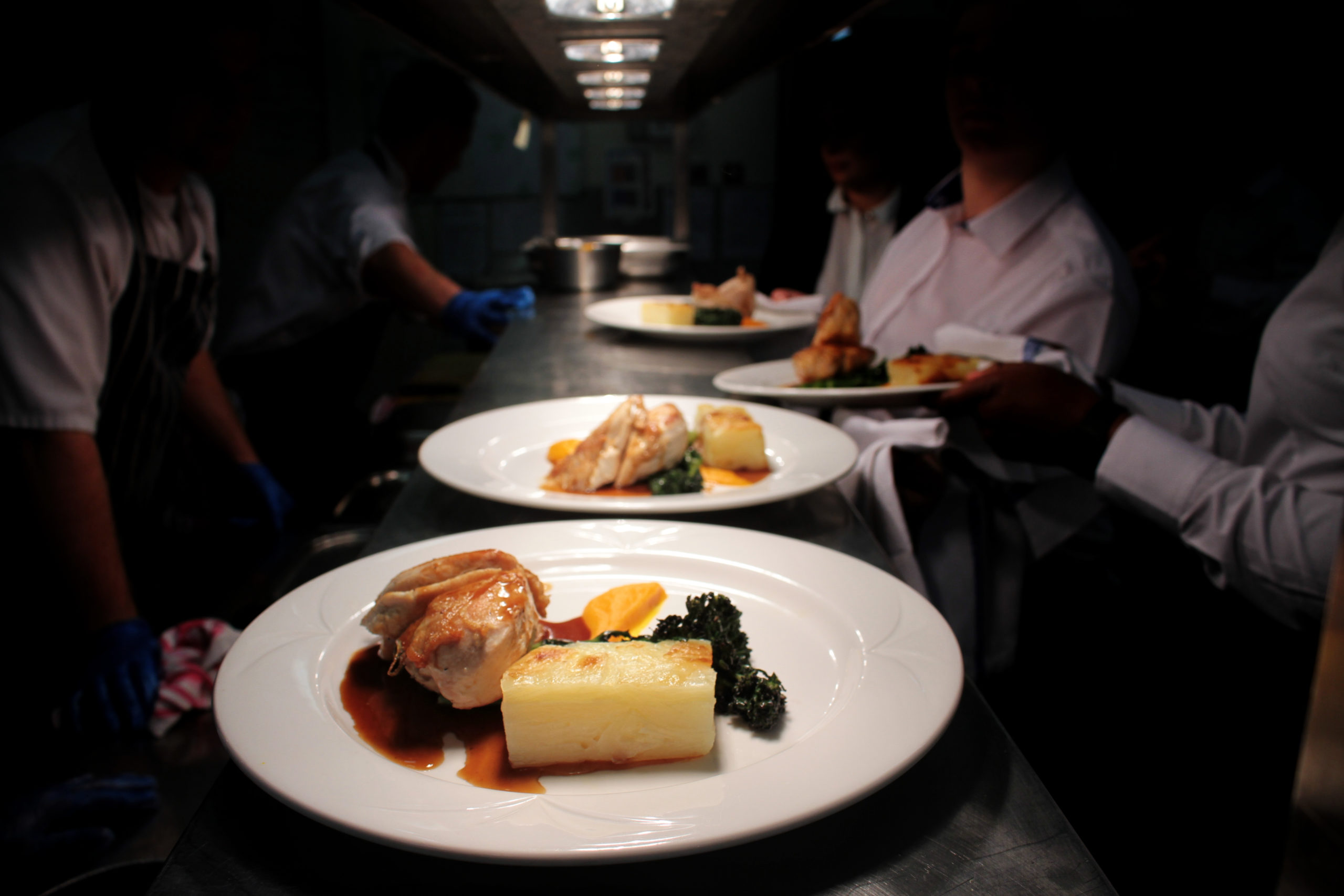 plated food being kept warm in kitchen